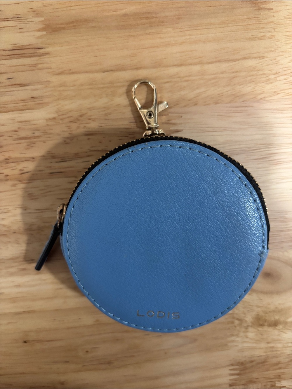 Lodis Sky Blue Round Leather Coin Case with Gold Clip